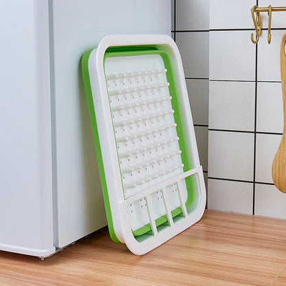 Egouttoir-vaisselle-silicone-pliable-vert