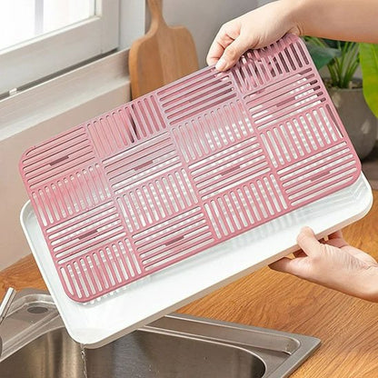 Égouttoir vaisselle design plateau en grille rose